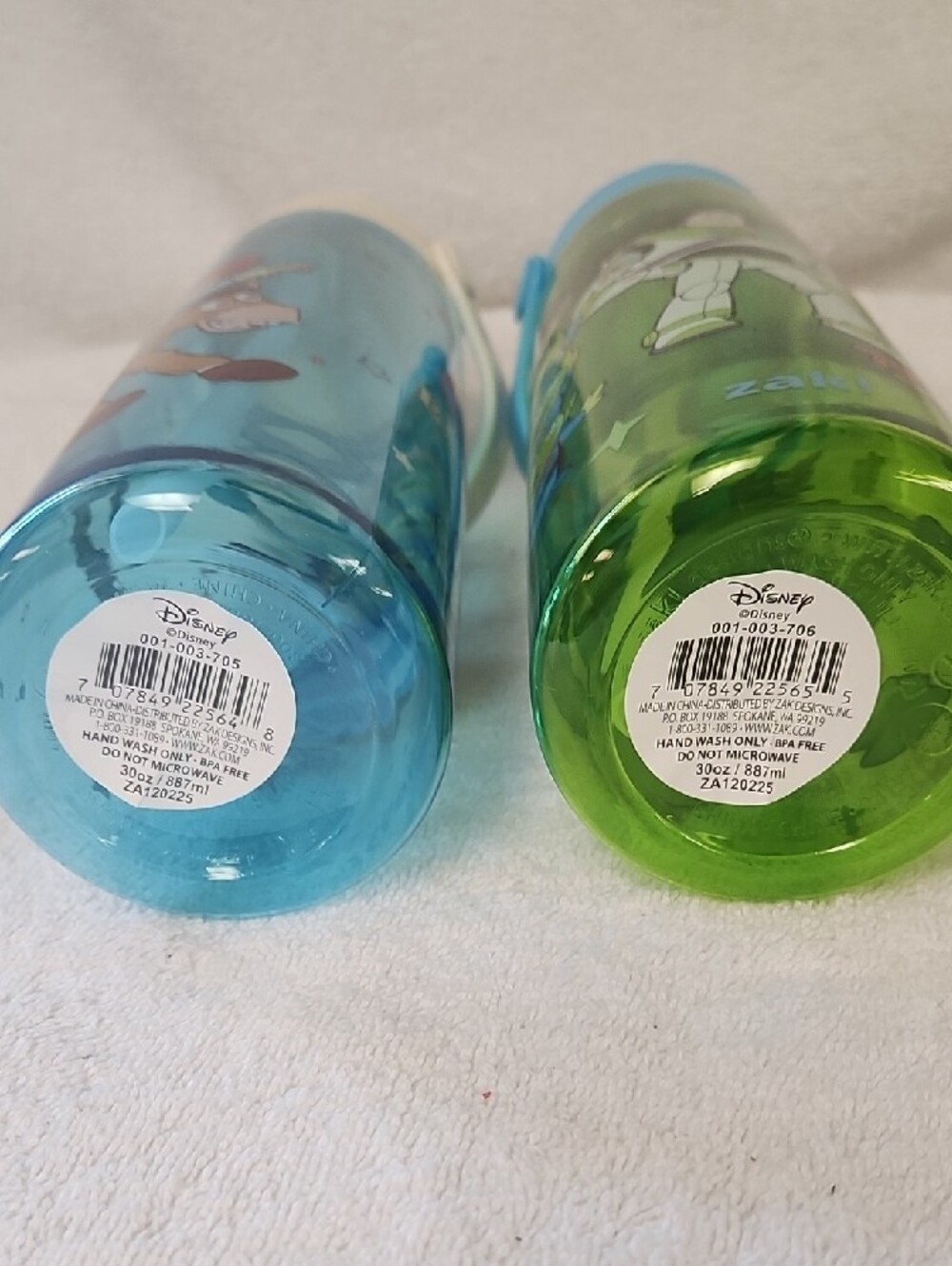 2 Kids' Toy Story Woody And Jessie Flip-Spout Water Bottles — Blue and Green - Picture 5 of 7